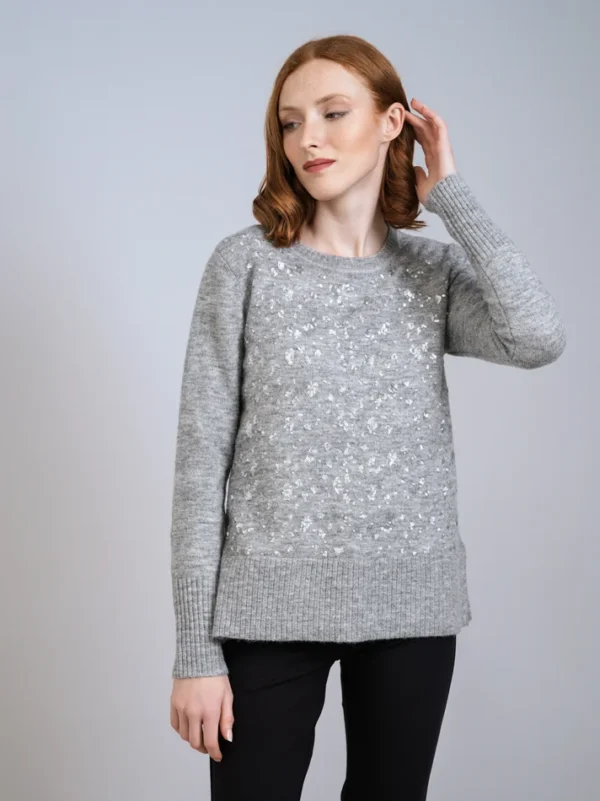Jersey gris lentejuelas.