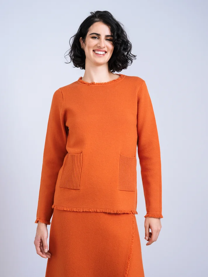 Jersey caldera con flecos.