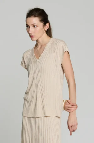 Suéter de punto en beige.