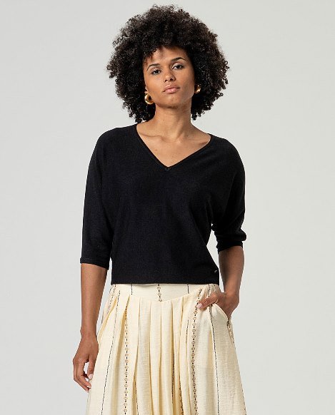 Jersey escote pico manga murciélago. Negro