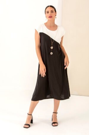 Vestido midi negro y beige.