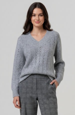 Jersey de pico con lentejuelas.